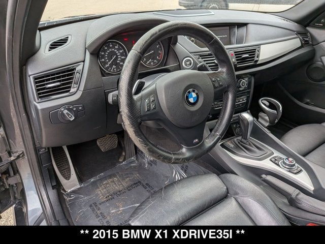 Used 2015 BMW X1 35i with VIN WBAVM5C57FVV95095 for sale in Okemos, MI